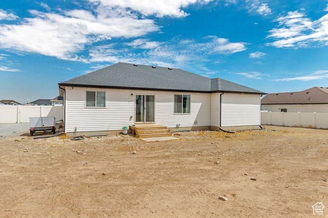 197 W Phelps St S, Grantsville, UT 84029 - rear view of property featuring a fenced backyard
