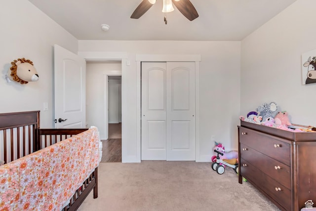 197 W Phelps St S, Grantsville, UT 84029 - bedroom with a closet, a ceiling fan, and light carpet