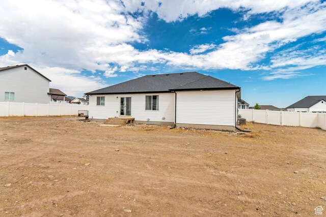 197 W Phelps St S, Grantsville, UT 84029 - rear view of property with a fenced backyard