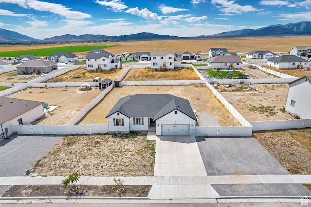197 W Phelps St S, Grantsville, UT 84029 - drone / aerial view with a residential view and a mountain view