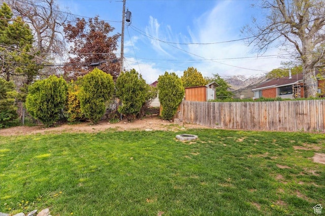 968 Bel Mar Dr, Ogden, UT 84403 - view of yard featuring fence and a fire pit