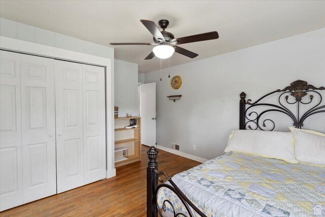 968 Bel Mar Dr, Ogden, UT 84403 - bedroom with visible vents, a closet, wood finished floors, baseboards, and a ceiling fan