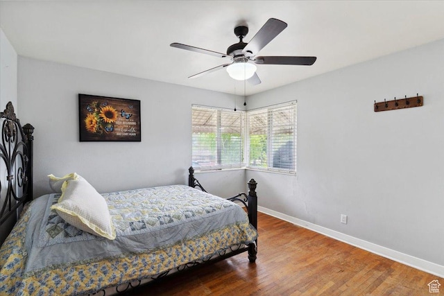 968 Bel Mar Dr, Ogden, UT 84403 - bedroom featuring baseboards, a ceiling fan, and wood finished floors