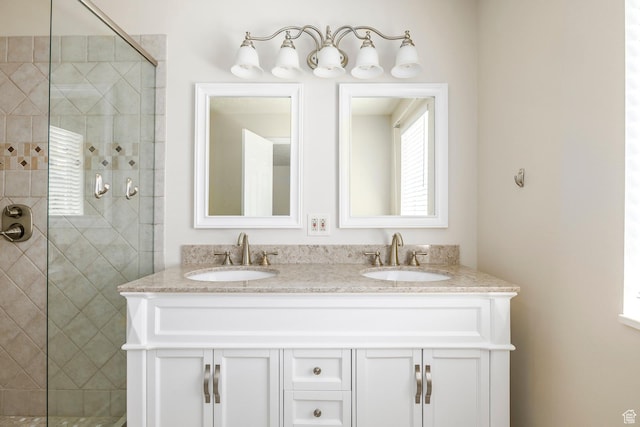 176 N 170 E, Orem, UT 84057 - full bathroom featuring double vanity, a tile shower, and a sink