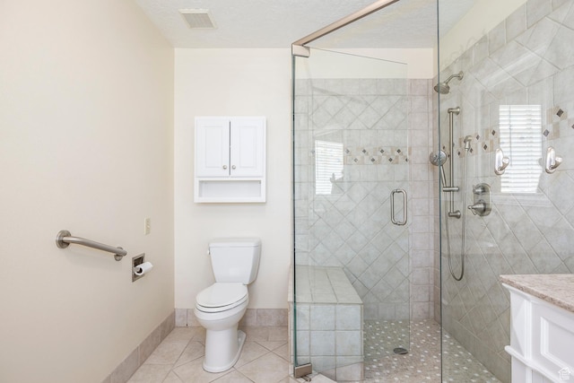 176 N 170 E, Orem, UT 84057 - bathroom featuring visible vents, a tile shower, tile patterned floors, baseboards, and toilet
