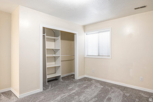 176 N 170 E, Orem, UT 84057 - unfurnished bedroom featuring visible vents, a textured ceiling, carpet, and a closet