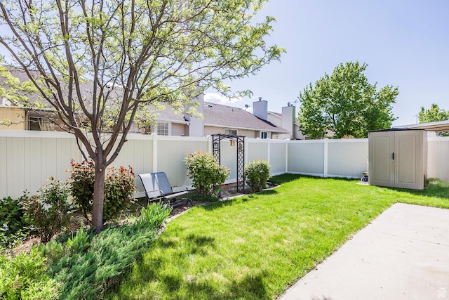 176 N 170 E, Orem, UT 84057 - view of yard featuring a fenced backyard, a storage unit, and an outdoor structure
