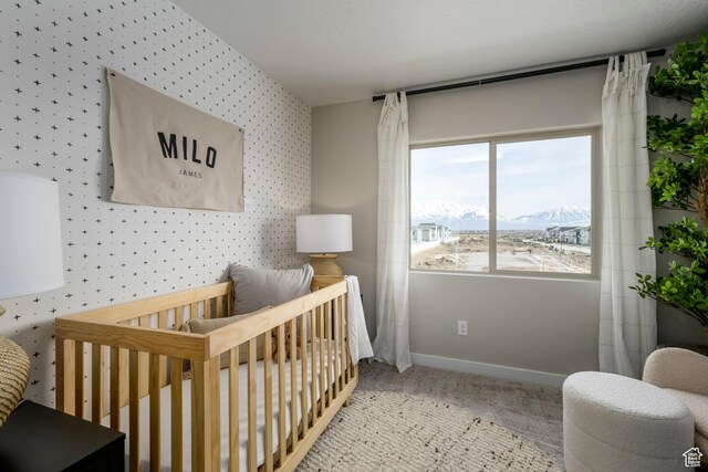 141 N Gallery St, Saratoga Springs, UT 84045 - bedroom featuring a nursery area, carpet, baseboards, wallpapered walls, and a mountain view