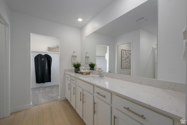 141 N Gallery St, Saratoga Springs, UT 84045 - full bathroom with vanity, baseboards, recessed lighting, and wood finished floors