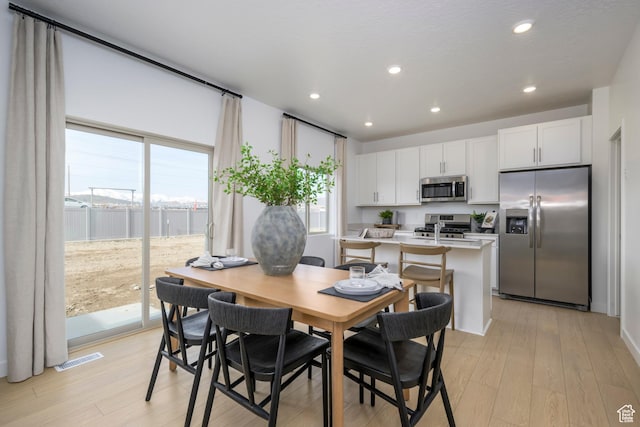 141 N Gallery St, Saratoga Springs, UT 84045 - dining space featuring recessed lighting, light wood-style flooring, and visible vents