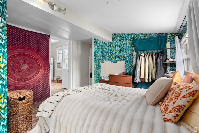 1470 S Edison St, Salt Lake City, UT 84115 - bedroom featuring wallpapered walls, wood finished floors, and cooling unit