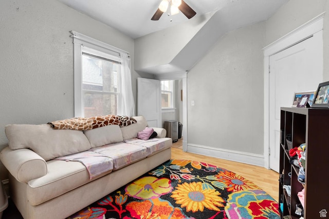 1470 S Edison St, Salt Lake City, UT 84115 - living area featuring baseboards, ceiling fan, vaulted ceiling, and light wood finished floors