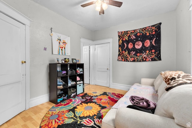 1470 S Edison St, Salt Lake City, UT 84115 - living area featuring baseboards, a ceiling fan, and wood finished floors