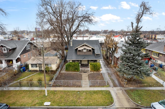 1470 S Edison St, Salt Lake City, UT 84115 - view of front of property with a residential view, a fenced front yard, a porch, and a front lawn