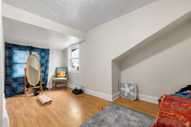 1470 S Edison St, Salt Lake City, UT 84115 - sitting room with baseboards, a textured ceiling, and wood finished floors
