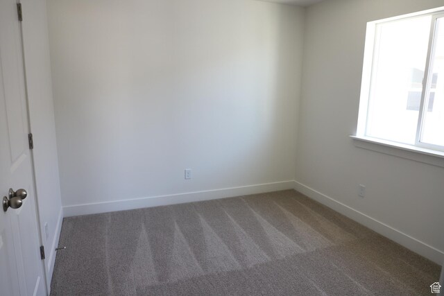 3743 N Janie St Unit 1010, Eagle Mountain, UT 84005 - carpeted spare room with baseboards