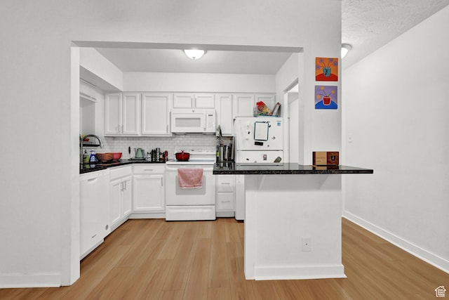 130 S 1300 E Unit 209, Salt Lake City, UT 84102 - kitchen featuring a sink, white cabinets, light wood finished floors, and white appliances