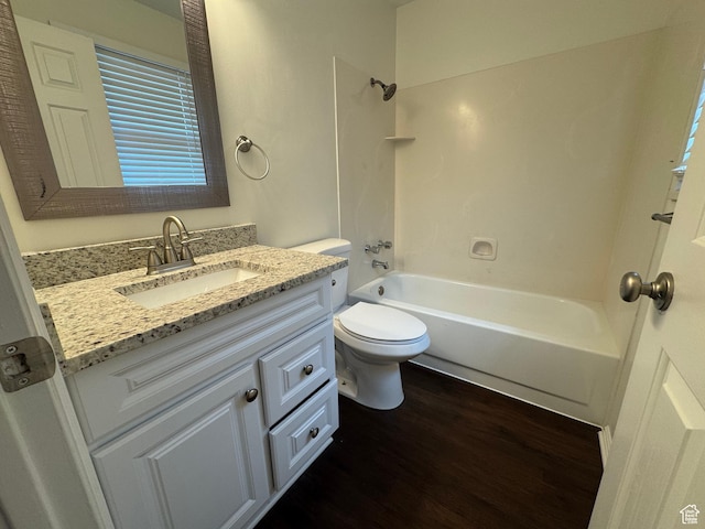 1952 E Sunset Dr, Layton, UT 84040 - bathroom with shower / bath combination, vanity, toilet, and wood finished floors