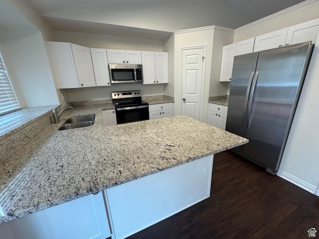 1952 E Sunset Dr, Layton, UT 84040 - kitchen featuring a sink, appliances with stainless steel finishes, a peninsula, and light stone counters