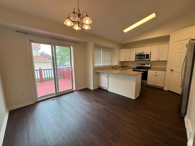 1952 E Sunset Dr, Layton, UT 84040 - kitchen with visible vents, an inviting chandelier, a peninsula, dark wood-style floors, and appliances with stainless steel finishes