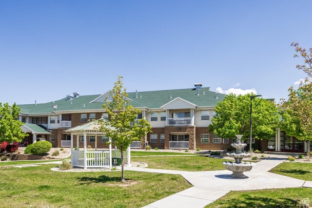 11035 S Grape Vine Cv Unit 106, Sandy, UT 84070 - view of community with a lawn