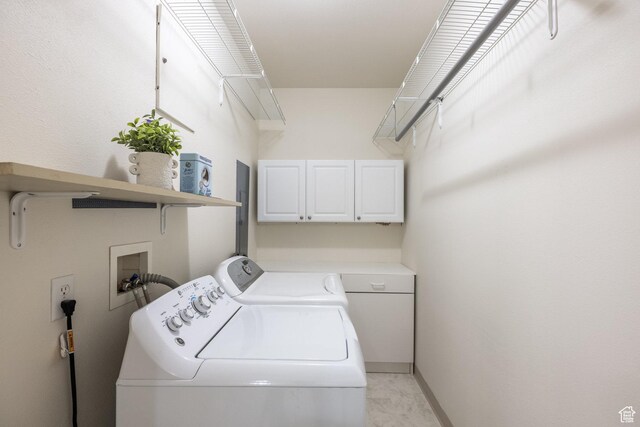 11035 S Grape Vine Cv Unit 106, Sandy, UT 84070 - washroom featuring cabinet space, baseboards, and washing machine and dryer