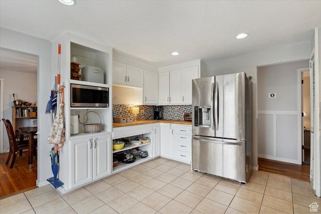 204 W 1250 N, Sunset, UT 84015 - kitchen featuring light countertops, appliances with stainless steel finishes, white cabinets, and open shelves