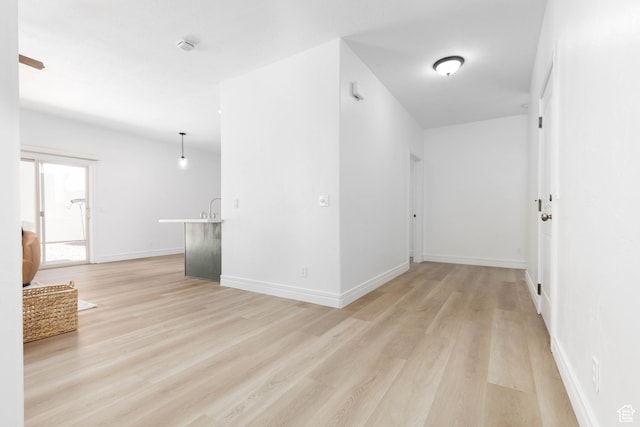 525 N 2480 W, Hurricane, UT 84737 - unfurnished room featuring baseboards and light wood-style flooring