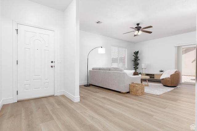525 N 2480 W, Hurricane, UT 84737 - living area featuring baseboards, ceiling fan, light wood finished floors, and visible vents