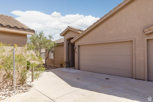 525 N 2480 W, Hurricane, UT 84737 - view of home's exterior with stucco siding and a tiled roof
