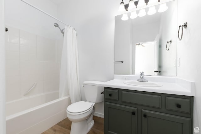 525 N 2480 W, Hurricane, UT 84737 - bathroom with vanity, toilet, wood finished floors, and shower / bath combination with curtain