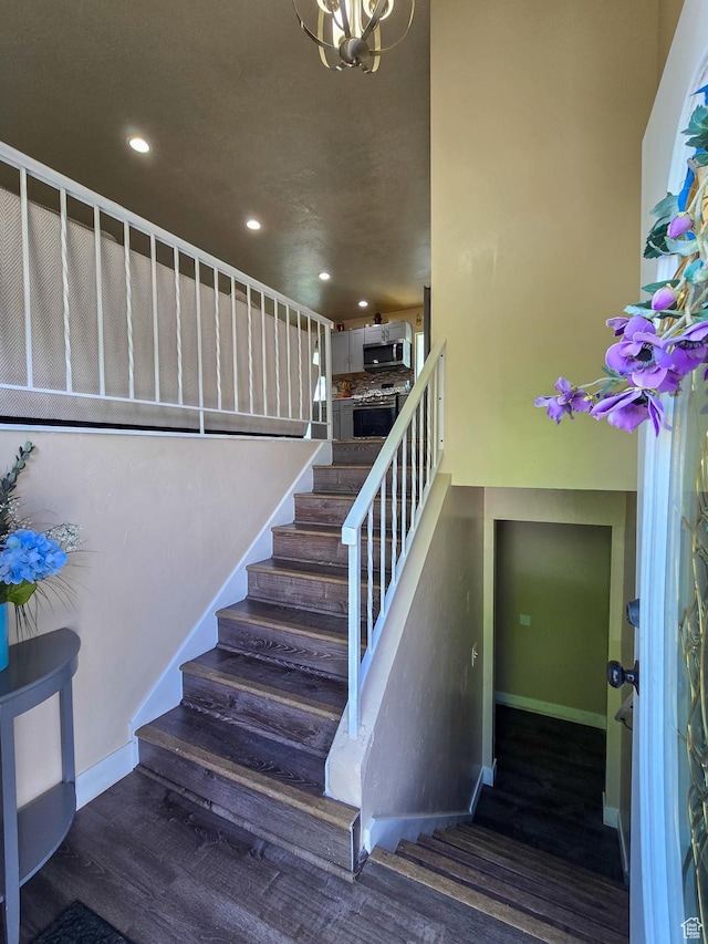 3505 W San Marcos Cir, West Valley City, UT 84119 - staircase with recessed lighting, baseboards, and a notable chandelier
