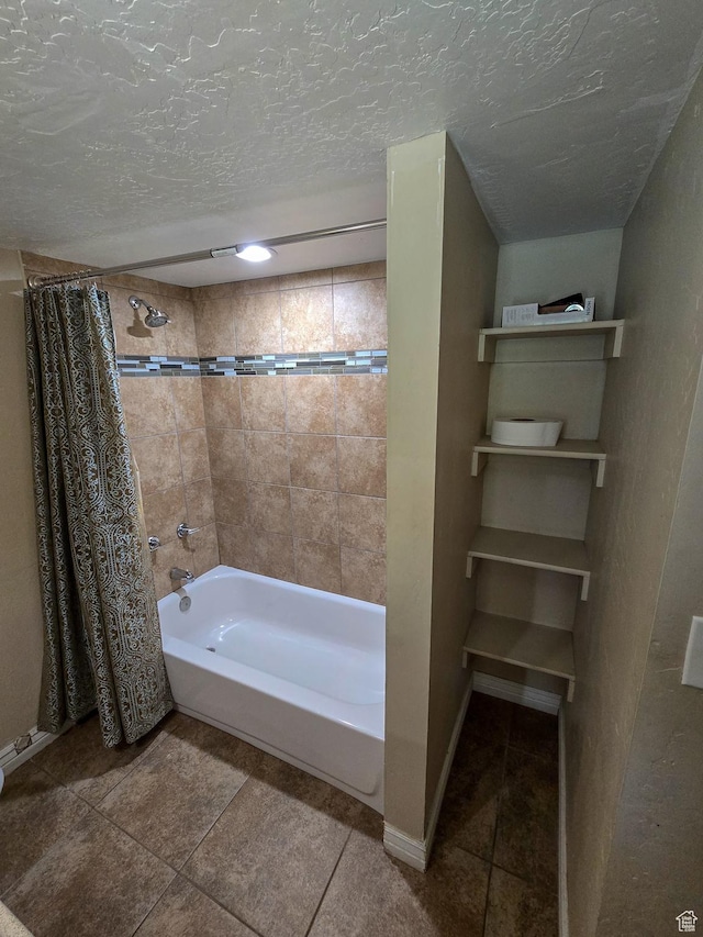 3505 W San Marcos Cir, West Valley City, UT 84119 - bathroom featuring tile patterned floors, baseboards, a textured ceiling, and shower / bath combination with curtain