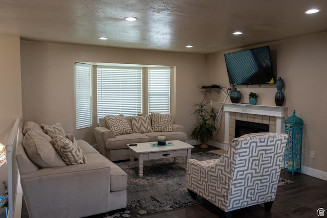 3505 W San Marcos Cir, West Valley City, UT 84119 - living area with dark wood-style flooring, baseboards, recessed lighting, and a fireplace