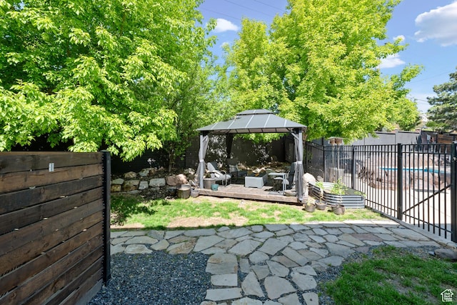 11622 S Worthington Ct E, Sandy, UT 84092 - fenced backyard featuring a patio area and a gazebo