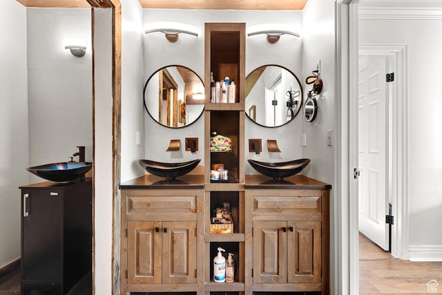 11622 S Worthington Ct E, Sandy, UT 84092 - bathroom featuring wood finished floors and double vanity