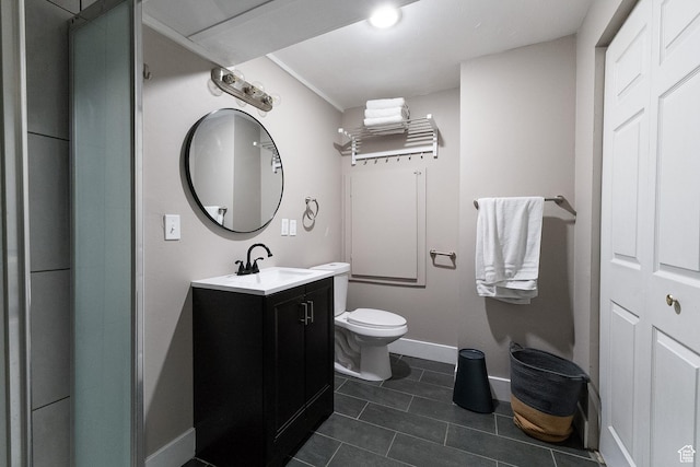 11622 S Worthington Ct E, Sandy, UT 84092 - full bathroom featuring vanity, toilet, baseboards, and tile patterned floors