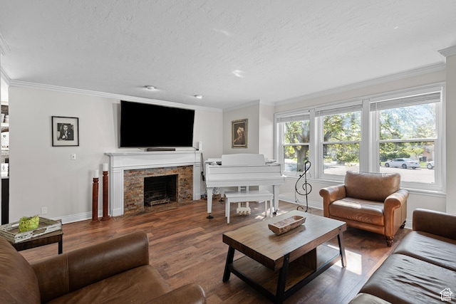 11622 S Worthington Ct E, Sandy, UT 84092 - living room with crown molding, wood finished floors, baseboards, a textured ceiling, and a fireplace