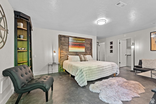 11622 S Worthington Ct E, Sandy, UT 84092 - bedroom featuring a textured ceiling, concrete flooring, and baseboards