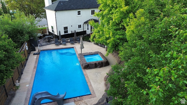 11622 S Worthington Ct E, Sandy, UT 84092 - view of pool featuring a fenced backyard, a patio, and a pool with connected hot tub