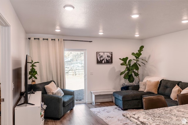 375 N 700 W, Vernal, UT 84078 - living room featuring recessed lighting, baseboards, and wood finished floors