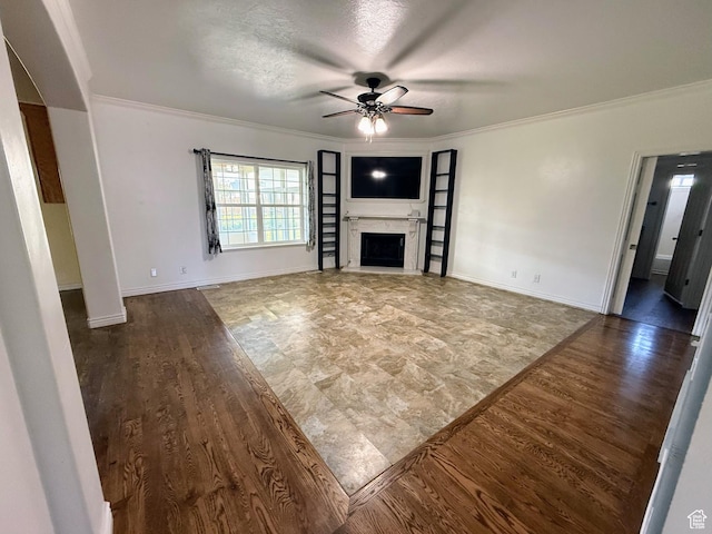 598 W 1620 S, Lehi, UT 84043 - unfurnished living room featuring a ceiling fan, a fireplace, ornamental molding, wood finished floors, and baseboards