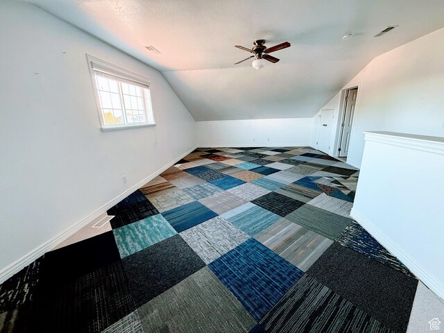 598 W 1620 S, Lehi, UT 84043 - additional living space with vaulted ceiling, a ceiling fan, baseboards, and carpet floors