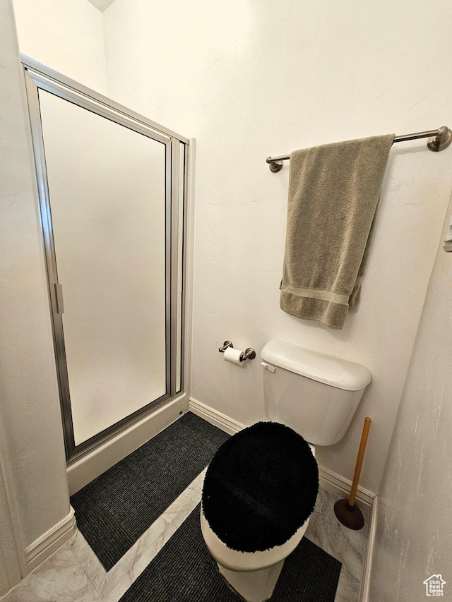 598 W 1620 S, Lehi, UT 84043 - bathroom featuring toilet, a stall shower, and baseboards