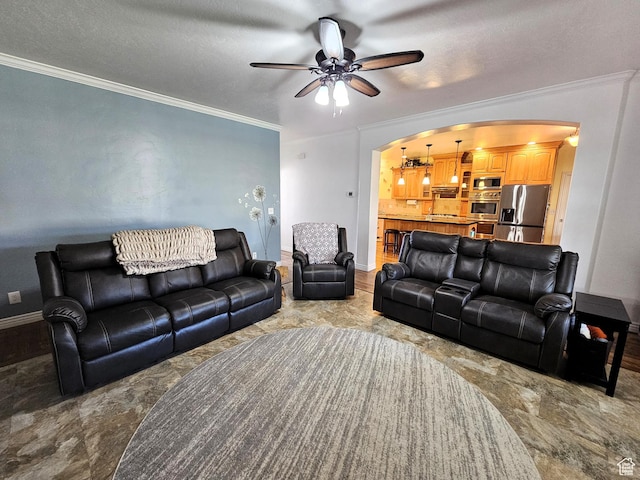 598 W 1620 S, Lehi, UT 84043 - living room featuring arched walkways, a ceiling fan, baseboards, and ornamental molding