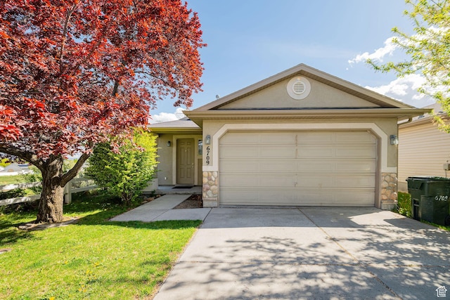 view of front of home with driveway, a garage, a front lawn, stone siding, and stucco siding