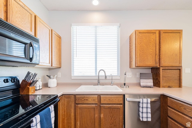 6709 S Empress Ln W, West Jordan, UT 84081 - kitchen featuring light countertops, recessed lighting, a sink, and black appliances