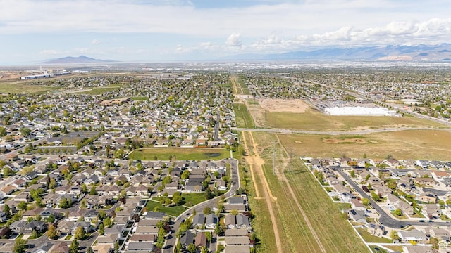 6709 S Empress Ln W, West Jordan, UT 84081 - drone / aerial view featuring a mountain view and a residential view