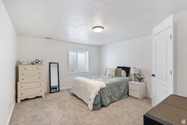 1295 N 190 E, Lehi, UT 84043 - bedroom featuring baseboards, visible vents, a textured ceiling, and light colored carpet