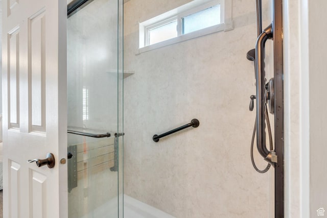 597 E Villager Ln, Midvale, UT 84047 - bathroom featuring a stall shower
